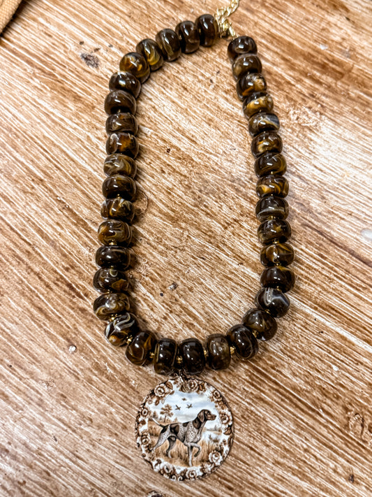 The beaded bird dog statement necklace